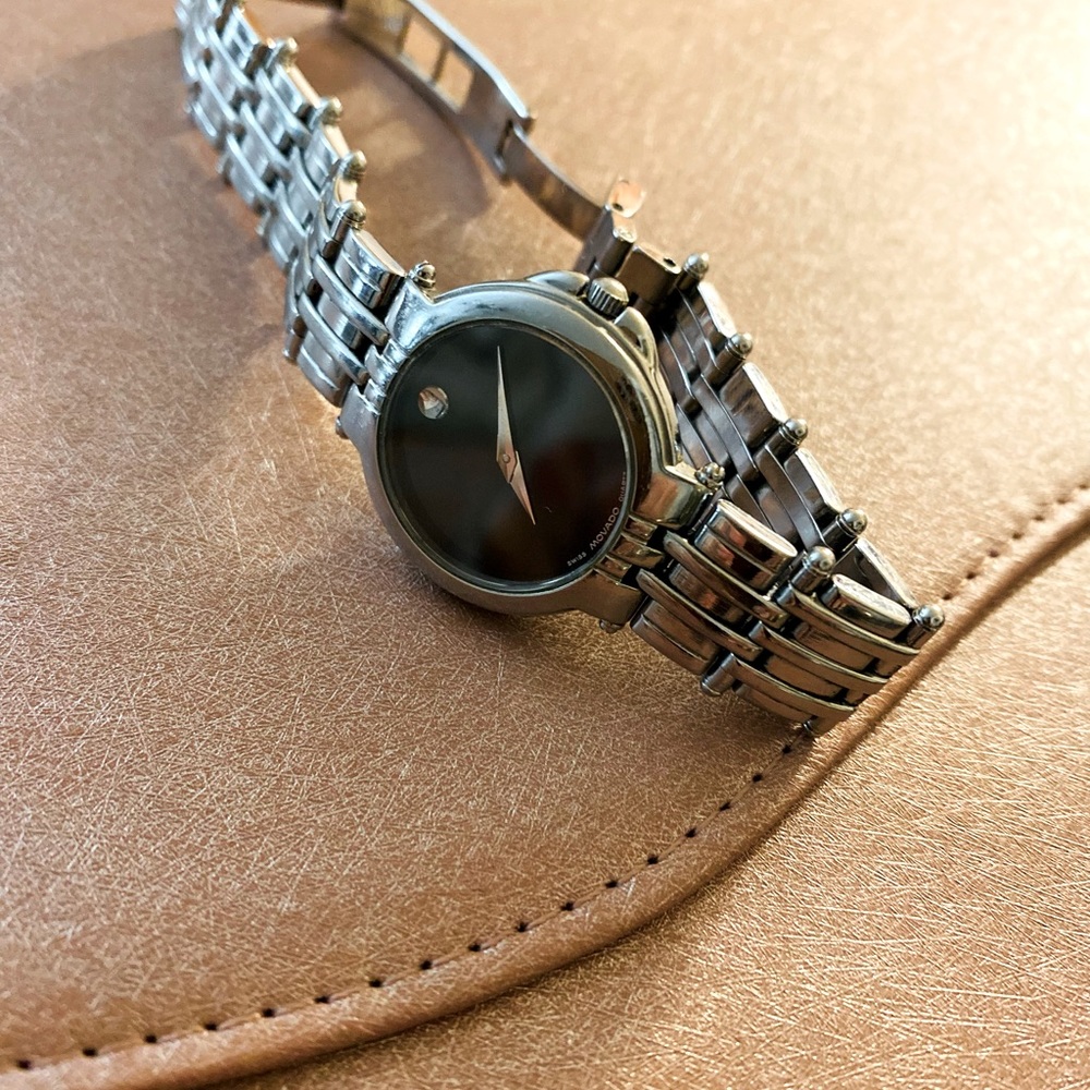 Movado black faced watch with silver band - Picture 3 of 3